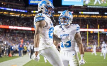 December 30, 2024; Santa Clara, California, USA; Detroit Lions running back Jahmyr Gibbs (26) celebrates with running back Craig Reynolds (13) after scoring in the fourth quarter at Levi's Stadium. Mandatory Credit: Images by Kyle Terada-Imagn