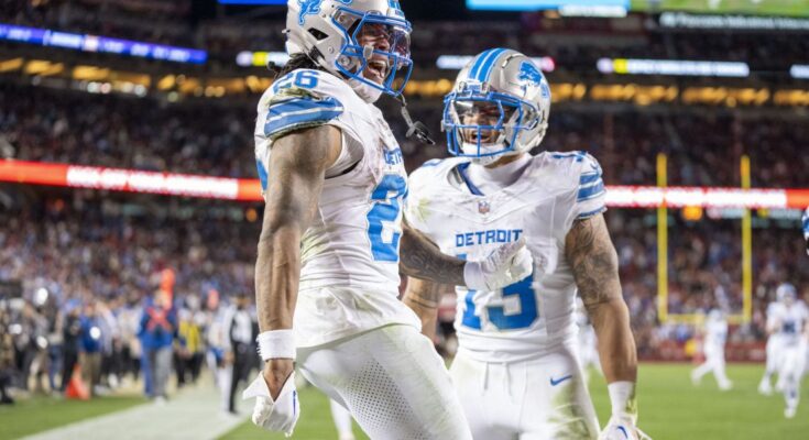 December 30, 2024; Santa Clara, California, USA; Detroit Lions running back Jahmyr Gibbs (26) celebrates with running back Craig Reynolds (13) after scoring in the fourth quarter at Levi's Stadium. Mandatory Credit: Images by Kyle Terada-Imagn