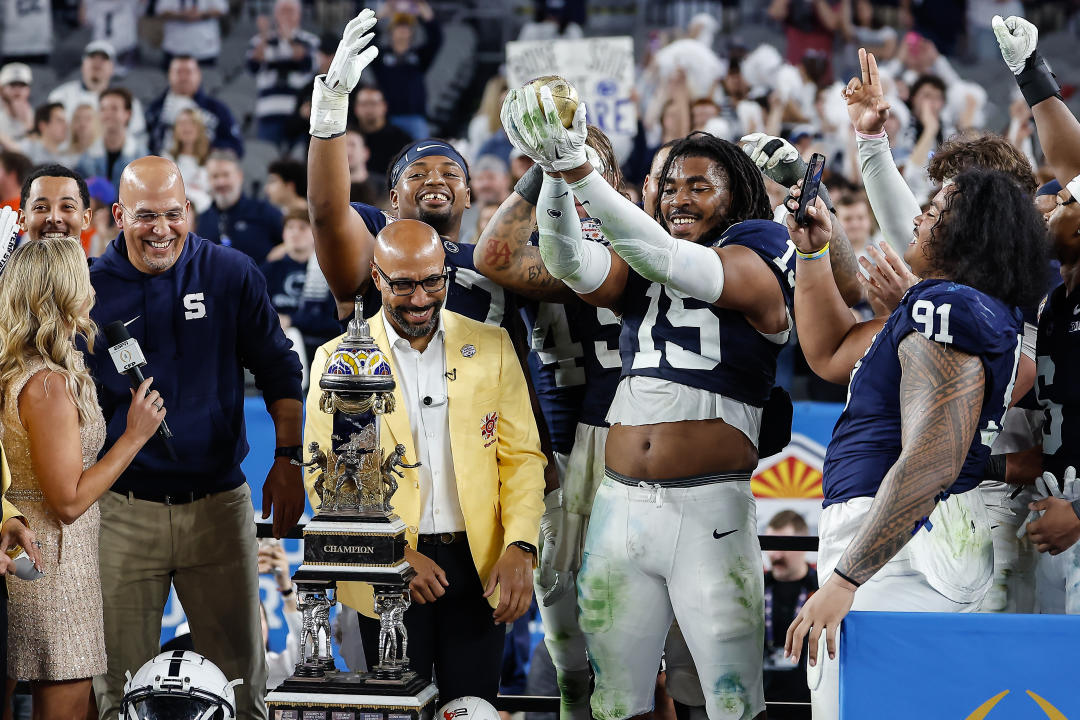 GLENDALE, AZ - DECEMBER 31: Defensive End Amin Vanover #15 of the Penn State Nittany Lions holds the Fiesta Bowl trophy after the Penn State Nittany Lions vs Boise State Broncos College Football Playoff Quarterfinal at Vrbo Fiesta Bowl on December 31,2024, State Farm Stadium Glendale, AZ. (Photo by Kevin Abele/Icon Sportswire via Getty Images)