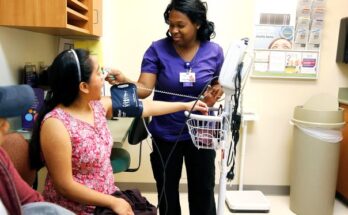 A HealthCare Connection nurse checks a patient's vitals in this 2017 photo. The nonprofit organization was founded in 1967 with the first health clinic in Lincoln Heights, then the largest municipality in the the most self-governing black community, but had no doctors or dentists working there.