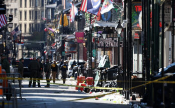 Members of the FBI and New Orleans Police are on the scene on Bourbon Street after at least 10 people were killed when someone drove into a crowd early on New Year's Day. (Chris Graythen/Getty Images)